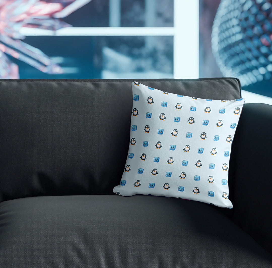 Pillow with penguin and ice cubes pattern on couch