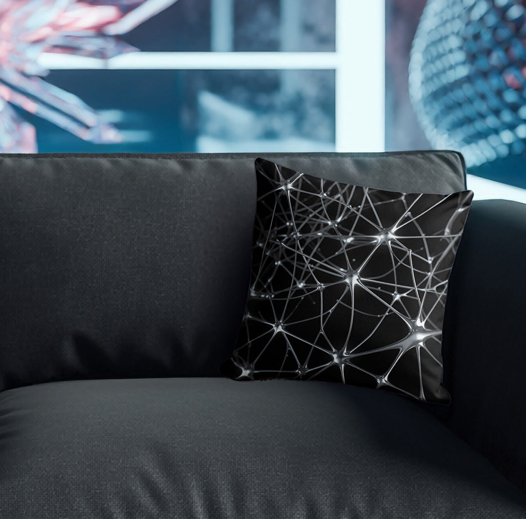 Pillow with silver abstract pattern on couch